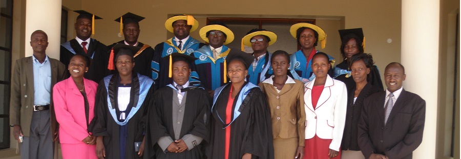 Kibabii university staff pose for photo after orientation of new students